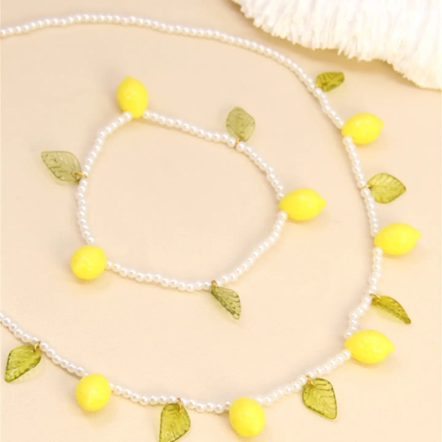 Parure Perle & Limoni – Freschezza Estiva Assicurata.